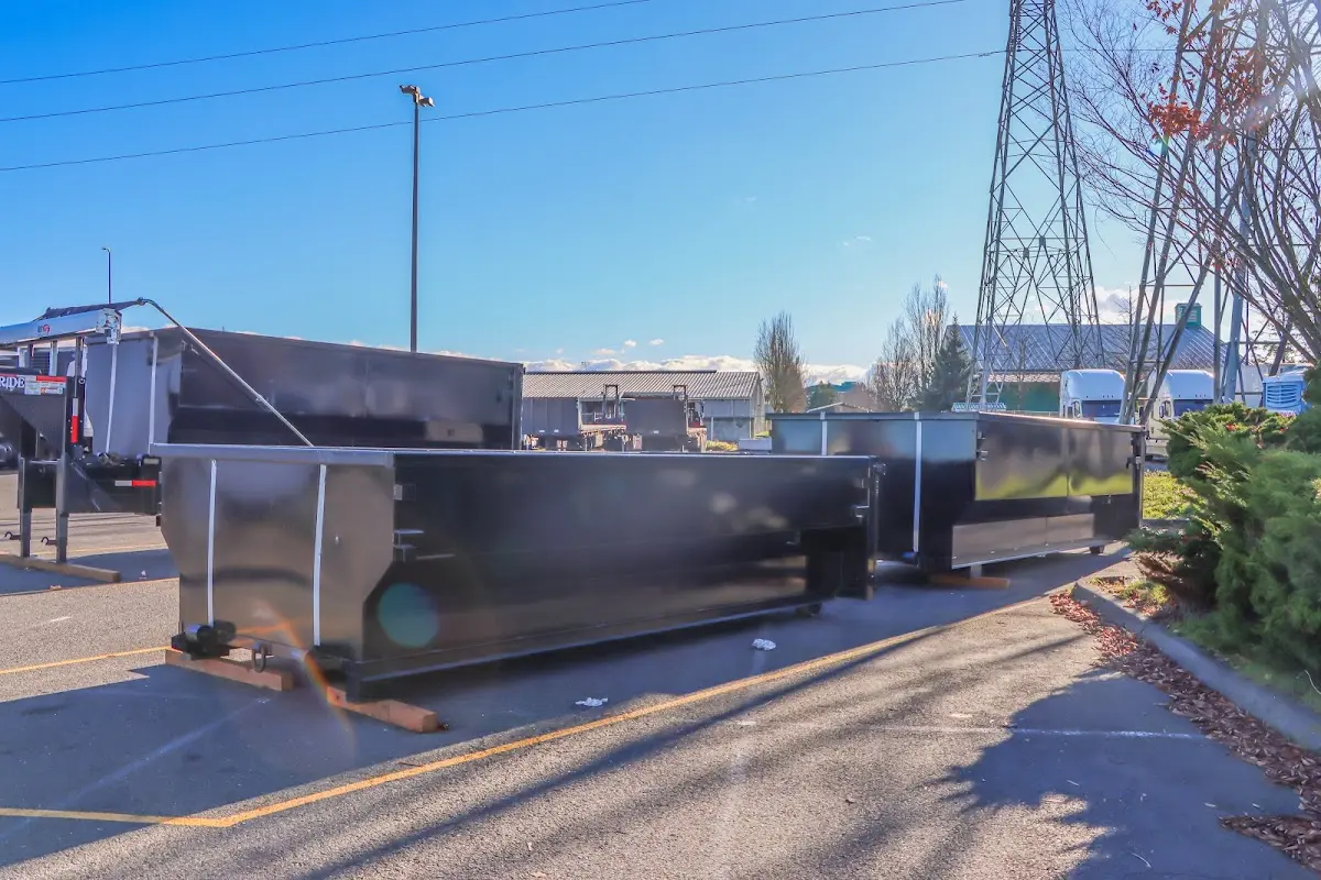 Roll-off dumpster ready for waste disposal at job site for Cleanout Dumpster Rental in Marshfield
